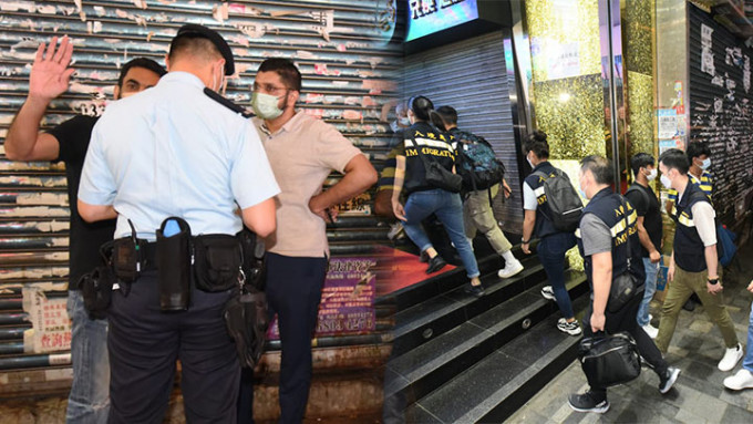 警方截查在重庆大厦出入的南亚裔人士。