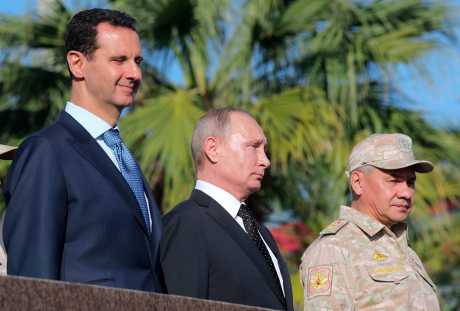 （左起）敘利亞總統巴沙爾、俄羅斯總統普京及俄羅斯國防部長蕭依古。AP