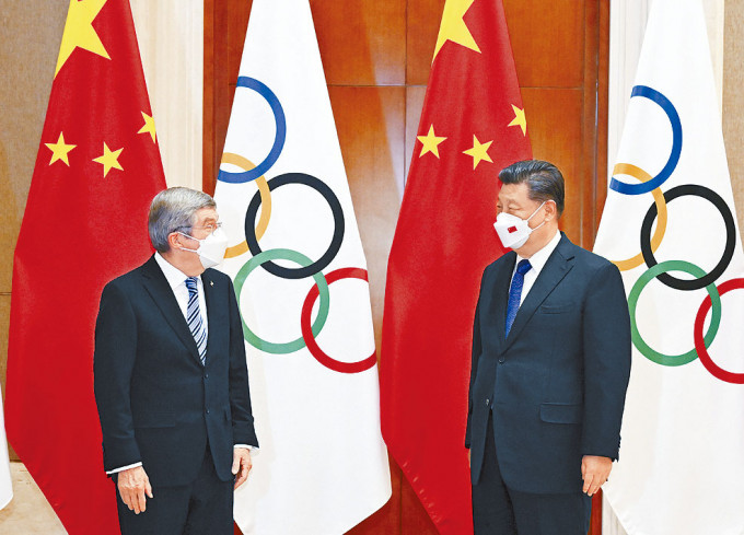 习近平在北京会见国际奥委会主席巴赫。
