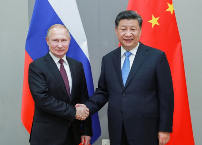 兩國元首發表聯合聲明，宣布延長《中俄睦鄰友好合作條約》有效期。新華社資料圖片