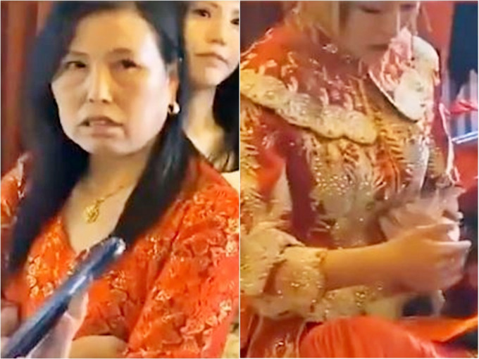 南京一名岳母不滿「開門利是」太少狂罵新郎，新娘冷眼旁觀，只顧數錢。影片截圖