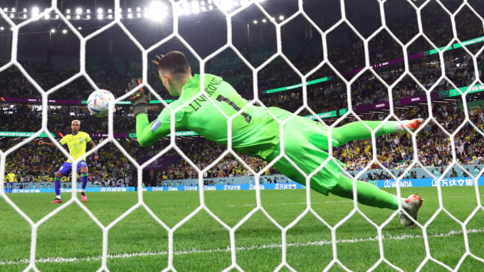 克罗地亚门将利华高域救洛迪高的十二码，保持格子军世界杯历史上三次互射十二码全胜。Reuters