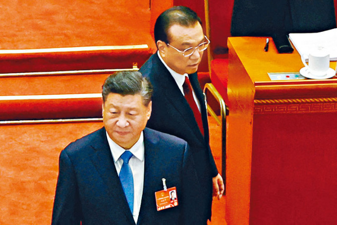 全国人大会议开幕，图为国家主席习近平(左)和国务院总理李克强(右)。