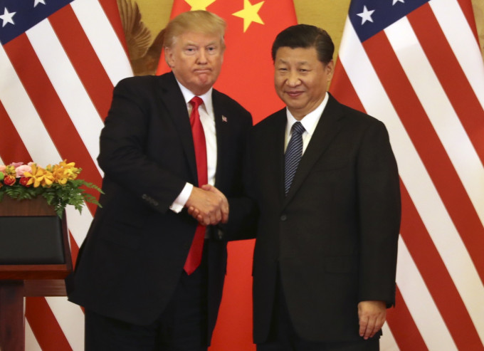 特朗普（左）警告中國。AP圖片