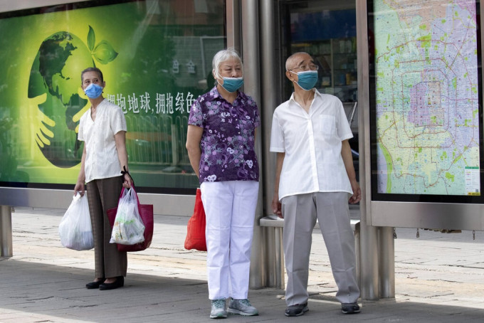 北京重大突發公共衛生事件三級應急響應上調為二級。AP圖片