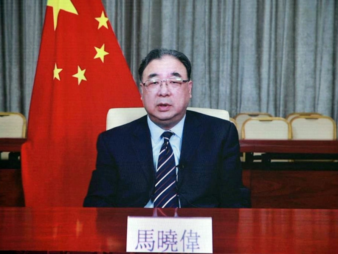 國家衞健委主任馬曉偉以視像形式致辭。