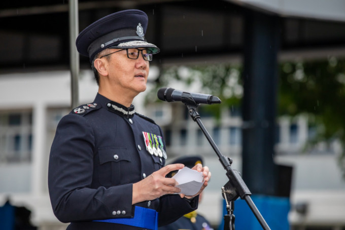 萧泽颐以检阅官身份主持香港交通安全队60周年大会操。