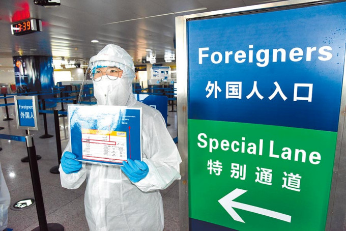 下周一起允許持三類有效居留許可外國人可入境中國。 新華社圖片