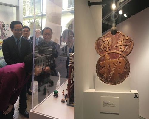 香港現存歷史最悠久的當舖招牌(右)，馬紹祥(左)指發展局十分重視文物保育。馬紹祥網誌