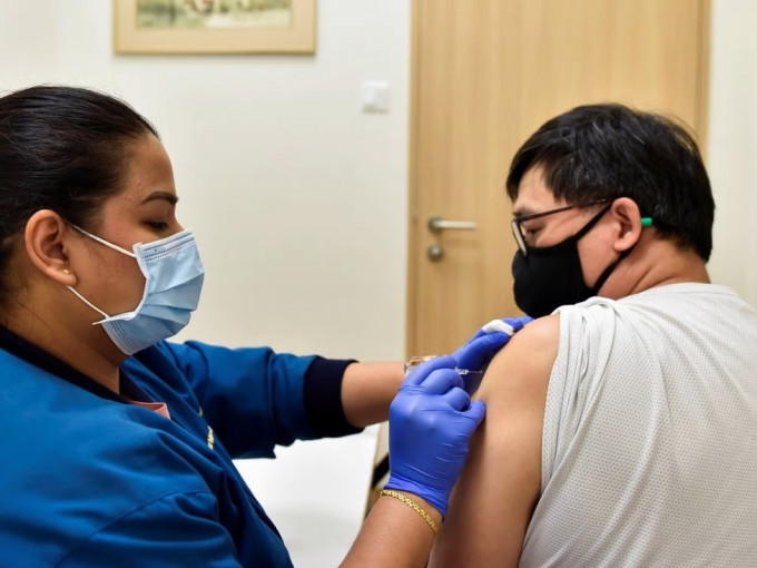 新加坡完整接种2剂疫苗的人口大概为85%。路透社资料图片