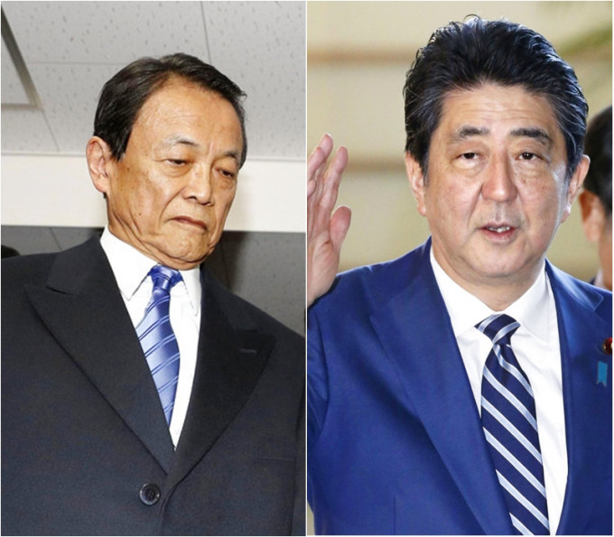 財務大臣麻生太郎（左）涉嫌掩飾首相安倍晉三裙帶主義醜聞。Ap圖片