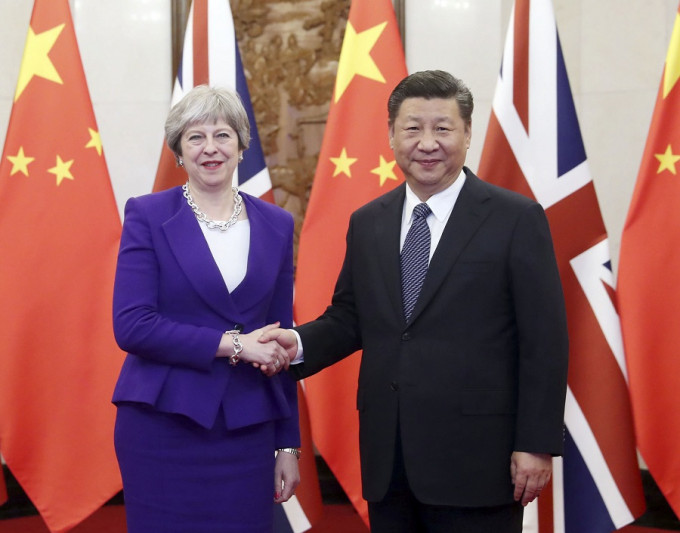英国首相文翠珊据报向习近平提及香港言论自由问题。新华社图片