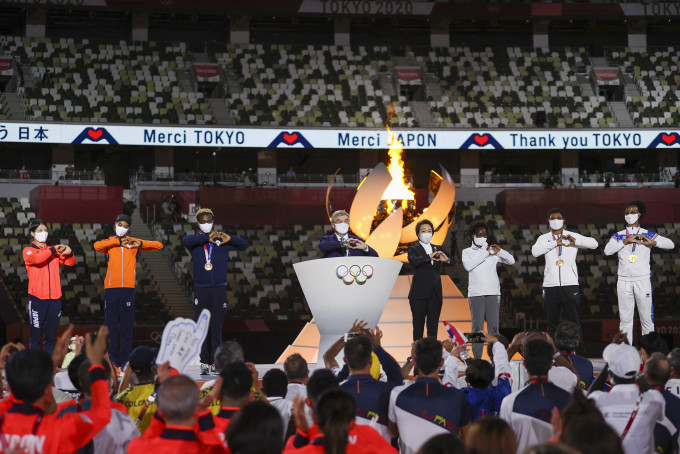 东京奥运出现「飞蛾扑环」一幕。AP图片