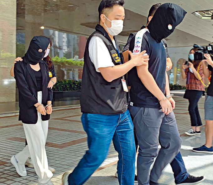 ■澳门司警拘捕涉嫌援交诈骗集团男女成员。