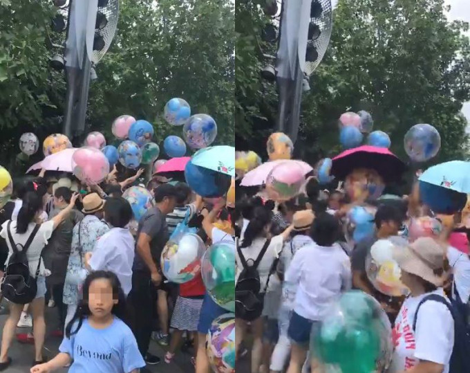 上海迪士尼昨日有遊客
集體搶氣球。網圖