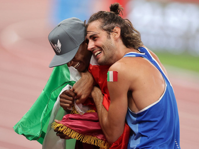 卡塔爾選手Barshim和意大利選手Tamberi平分跳高金牌獎項。路透社圖片