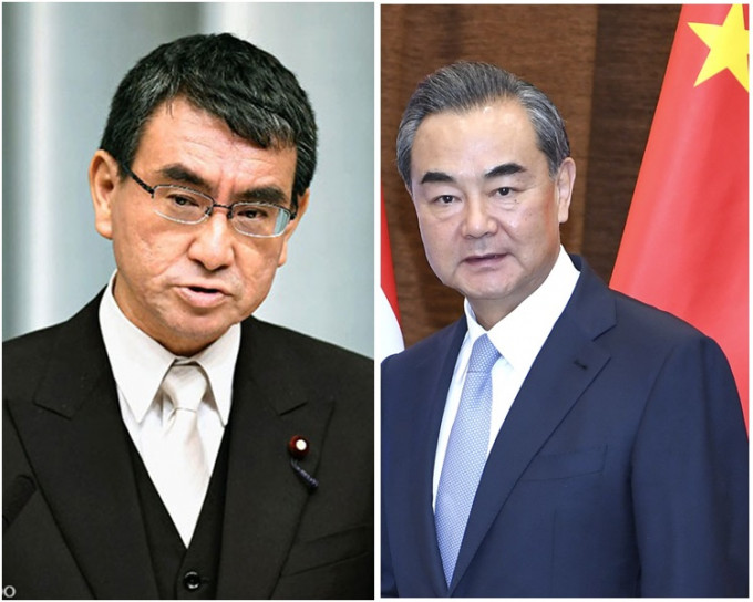 日方正协调河野太郎(左)与王毅(右)会面。