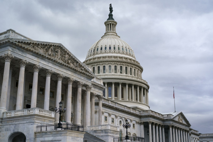 美国众议院通过临时调高债务上限。AP图片
