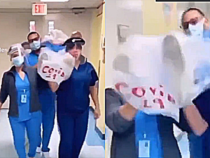 外國醫護持新冠屍袋跳黑人抬棺舞，網民批惡趣味。影片截圖