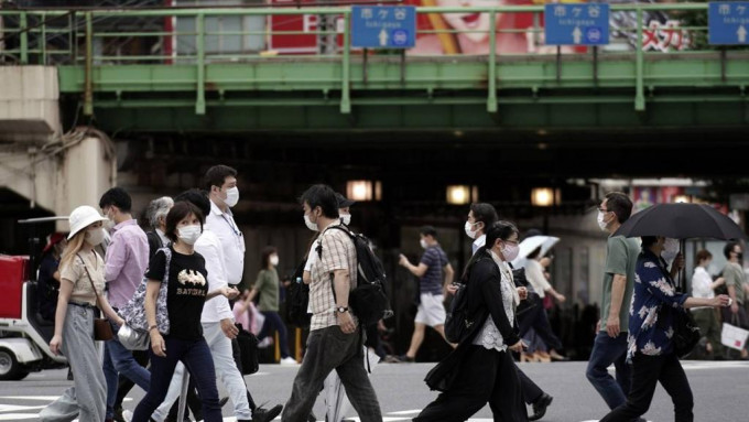 日本人均寿命十年来首次缩短。AP资料图片