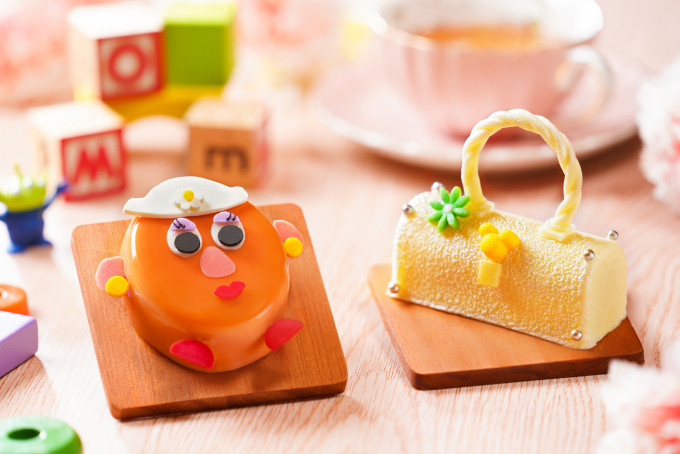  香港迪士尼樂園度假區精心炮製的閃鑽手袋形杏仁香橙蛋糕和薯蛋頭太太紫薯椰香蛋糕」一定令媽媽甜入心！