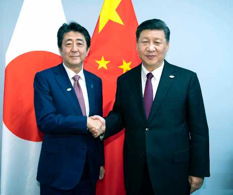 （左起）日本首相安倍晉三6月下旬將與中國國家主席習近平舉行雙邊高峰會。資料圖片