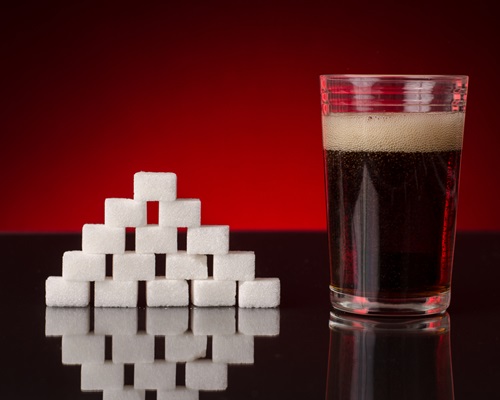 英國明年徵「糖稅」，一罐可樂收0.75港元。網上圖片