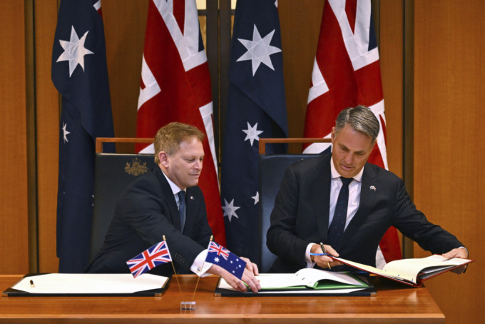 英国与澳洲在坎培拉签署一项新的国防和安全合作协议。美联社