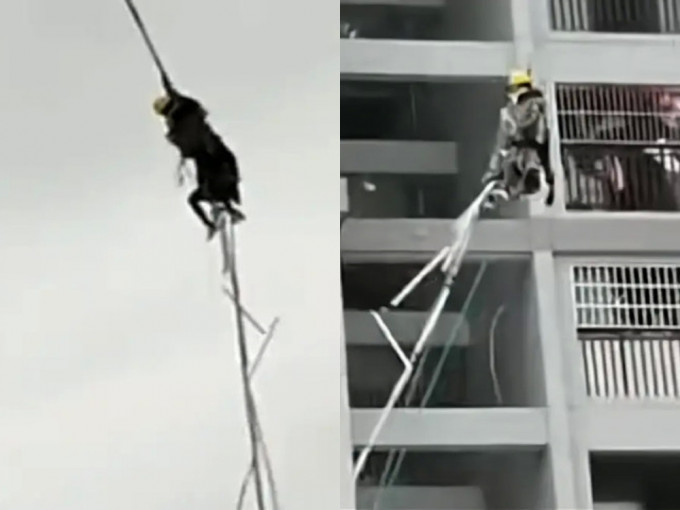 广西2工人被大风吹起 ，吊在半空中左右摇摆。影片截图