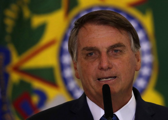 博索納羅斥責巴西民眾勿為新冠疫情「哭哭啼啼」，備受批評。AP圖