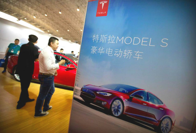 Tesla中国分公司随即减价。AP图片