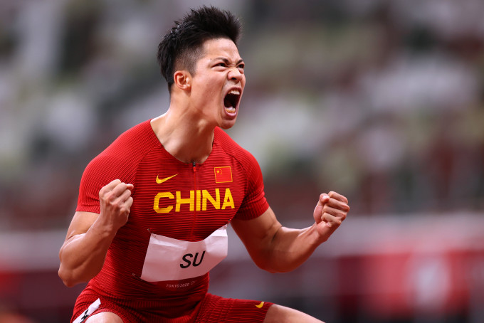 蘇炳添在東奧百米短跑準決賽創出驚人紀錄，賽後興奮振臂狂呼。Reuters