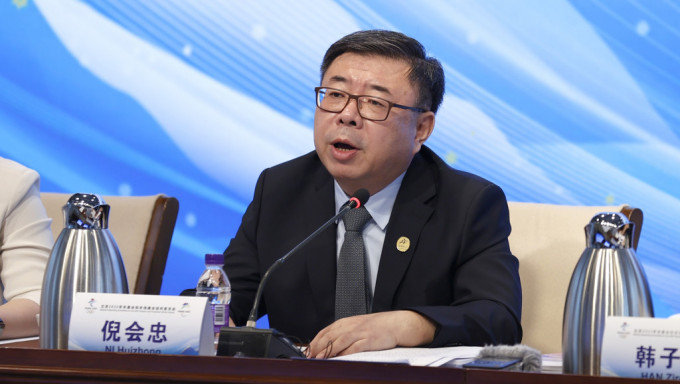 倪會忠是冬奧會中國代表團秘書長。