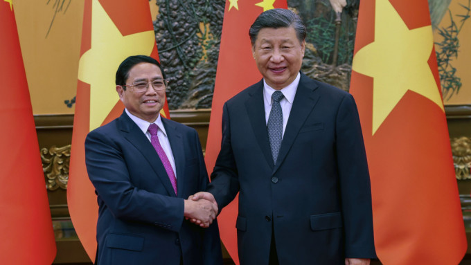 越南总理范明正今年6月访问北京获习近平接待。 美联社