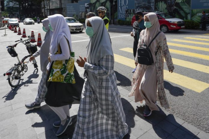 马来西亚妇女。AP图片