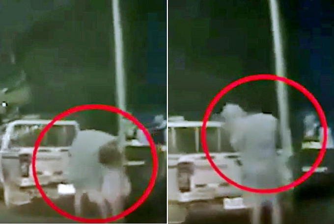 广东肇庆近日网传一段「男子打人被传唤后，将女儿扔上警车车尾」的片段。　影片截图
