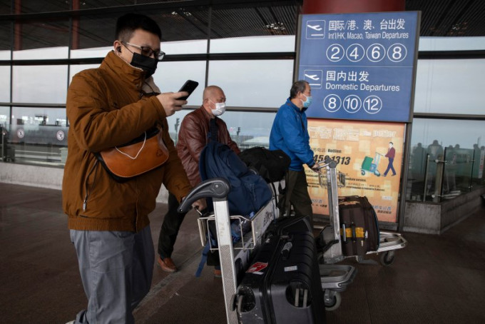 北京加强管控国际航班。AP图片