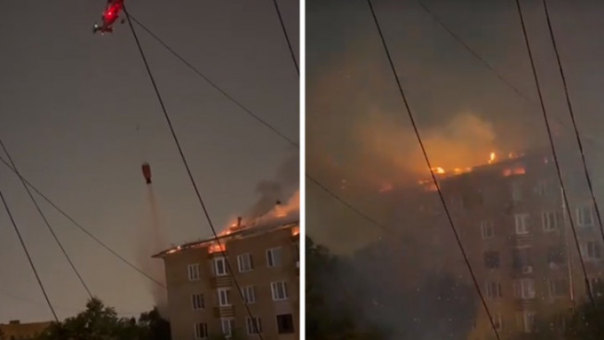 莫斯科一幢住宅凌晨發生大火，當局一度出動直升機投擲水彈撲救。網上影片截圖