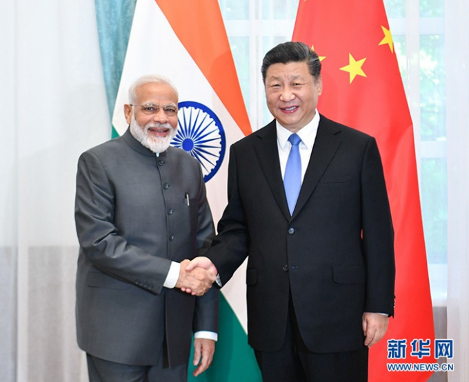 國家主席習近平與印度總理莫迪。新華社圖片