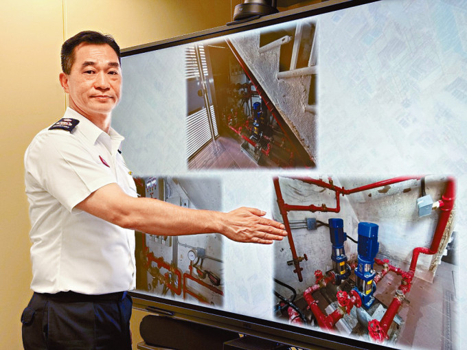 黃旭平介紹「直接泵水設計」系統，指已有兩座大廈完成設置。