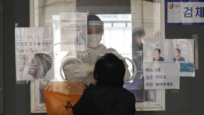 南韓昨日新增確診病例為18.7萬宗。美聯社圖片
