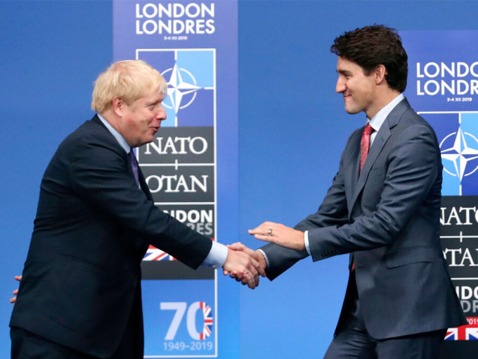 英国和加拿大签署过渡性质贸易协议。AP资料图