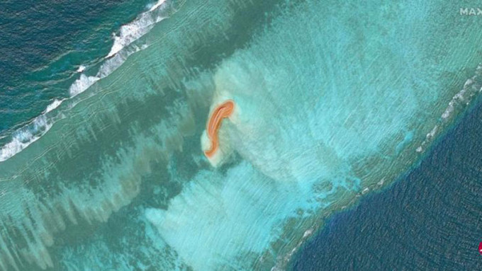 衛星圖今年11月4日拍下的南沙群島安達礁。AP圖