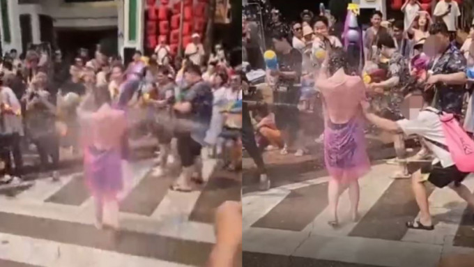 網傳有女子在街頭被「圍攻」，甚至有男子出手，試圖扯下其雨衣。(互聯網)