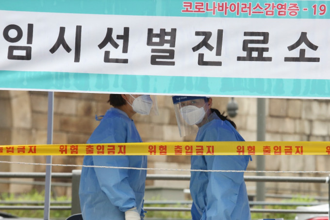韓國新冠肺炎增166宗。AP圖