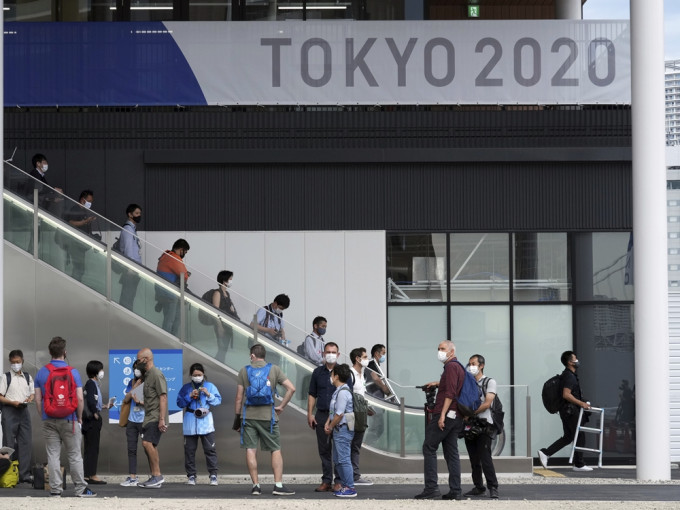 东京奥运主办单位宣布，决定将赛事入场观众人数上限定为一万人。AP相片