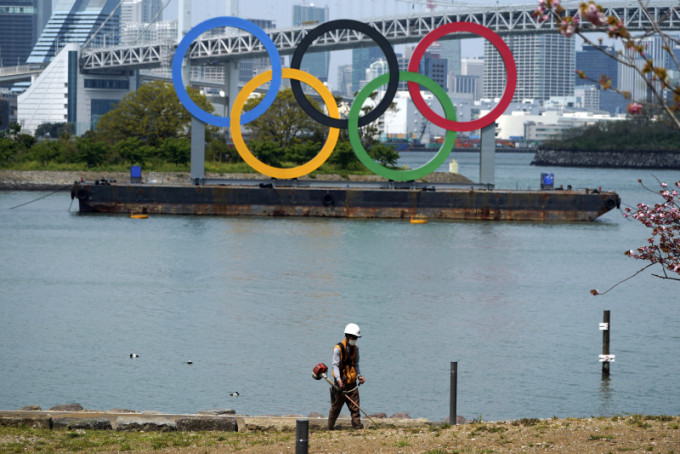 日本否认承担3000亿日元奥运延期费用。AP图
