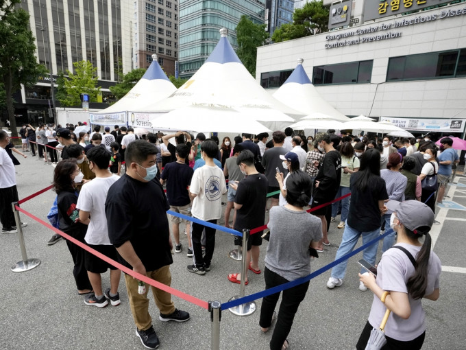 南韓增1100宗確診。AP圖片