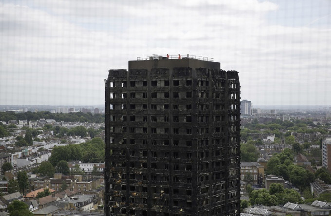 英国伦敦大火反映出消防装备不足。AP图片