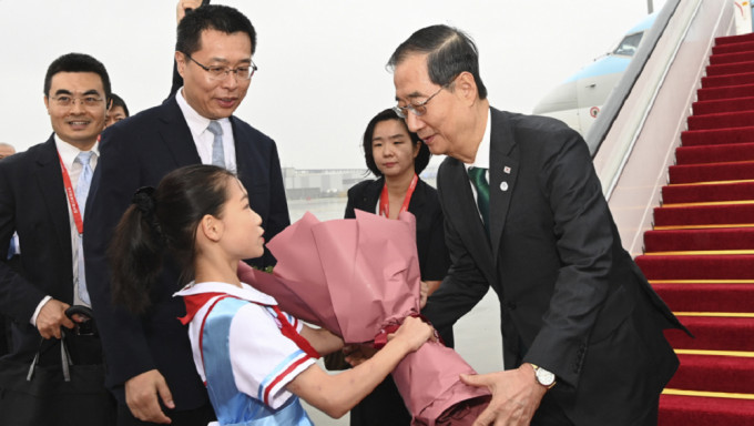 南韩总理韩德洙抵达杭州。新华社